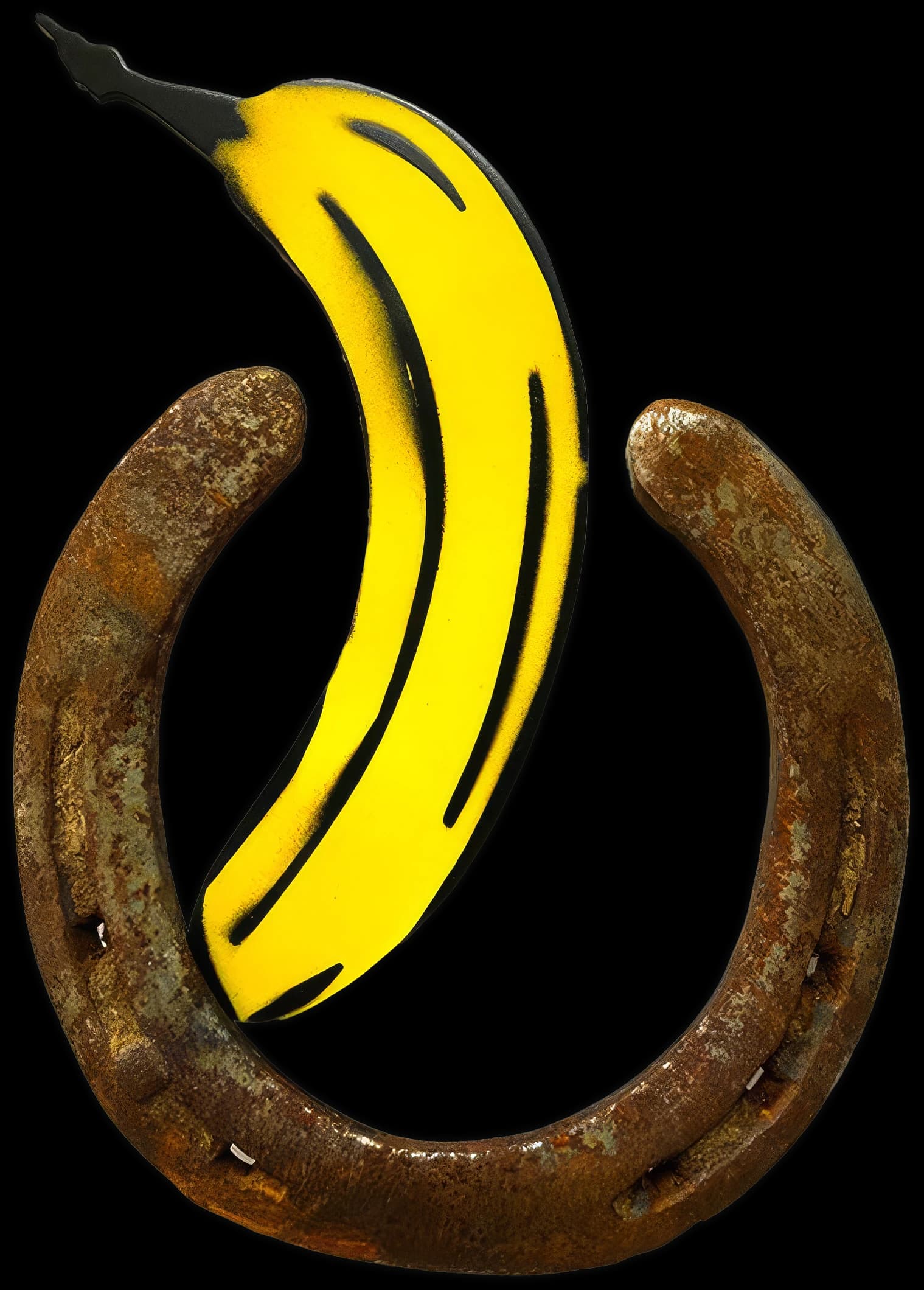 Gelbe Banane über einem rostigen Hufeisen auf schwarzem Hintergrund.