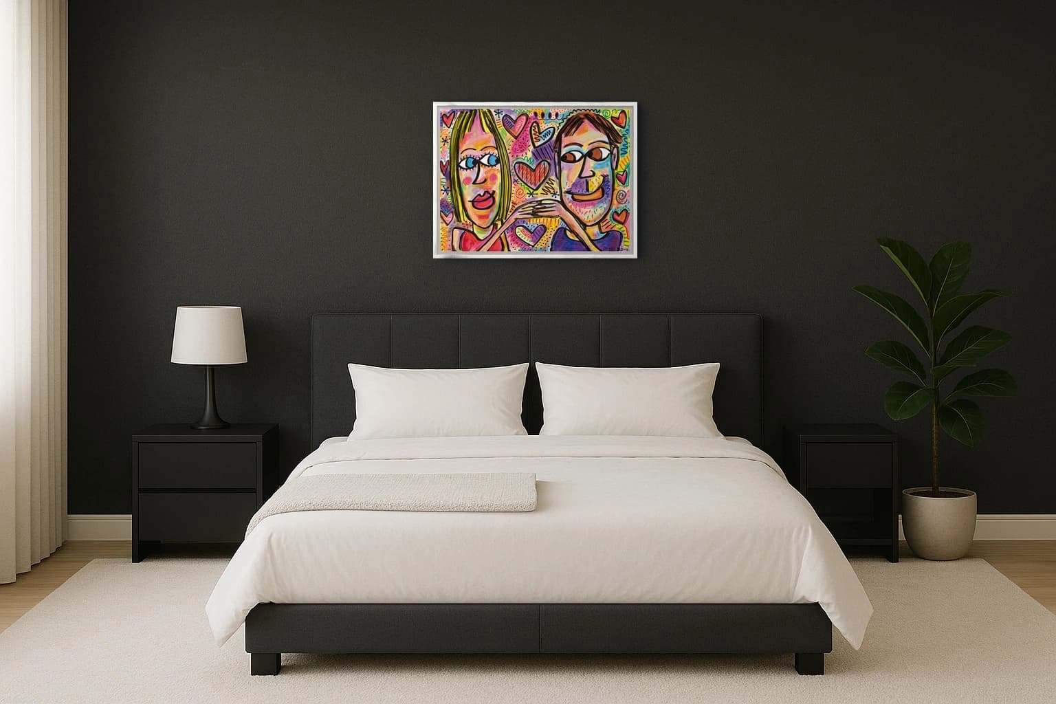 Zwei stilisierte Gesichter vor buntem Hintergrund mit vielen Herzen, als Kunstwerk an der Wand eines hellen Schlafzimmers.