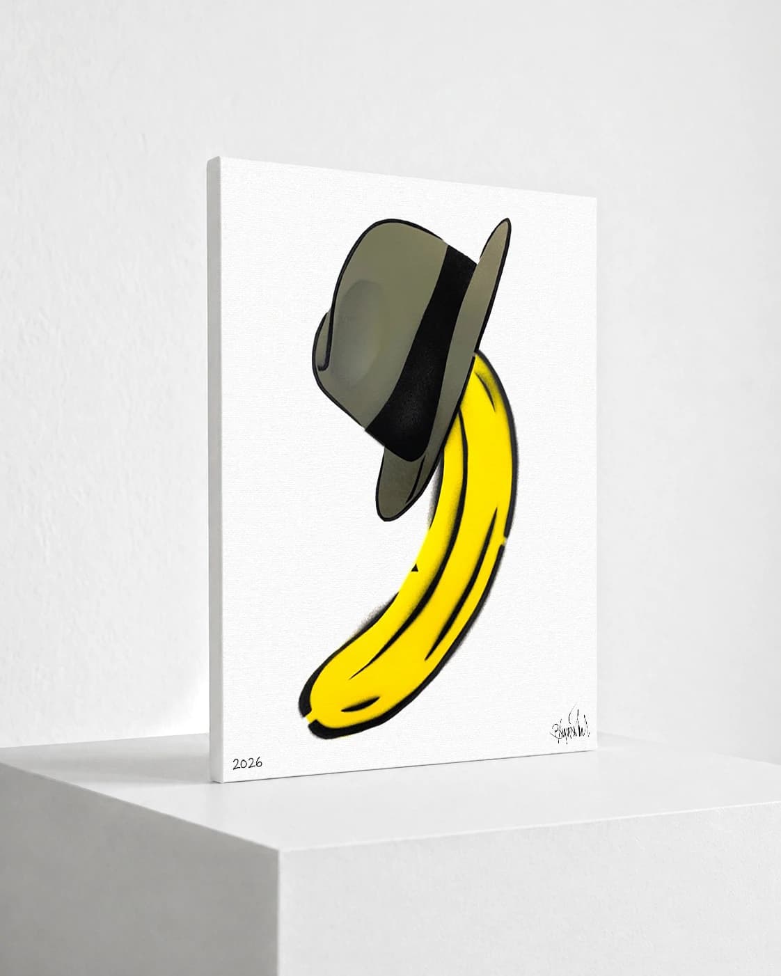 Gelbe Banane mit grauem Hut auf weißem Hintergrund, unten links 2026 und rechts eine Signatur.