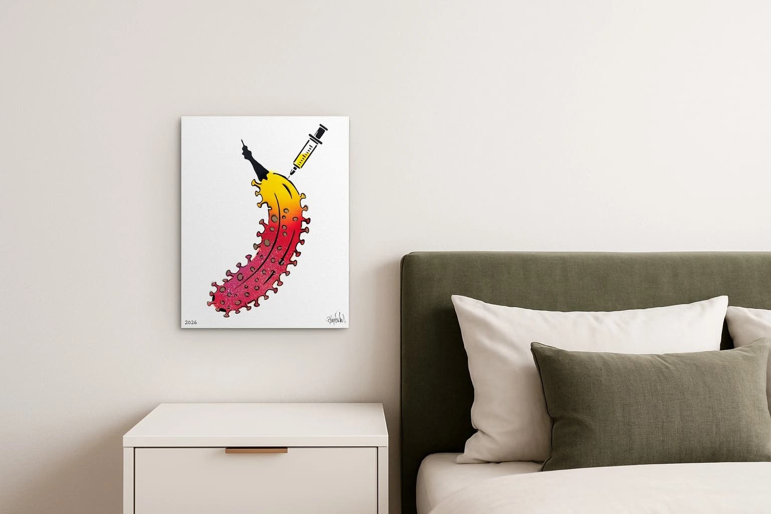Bunte Banane mit Spritze, Signatur und 2026 auf Weiß, als Kunstwerk an der Wand eines Schlafzimmers.