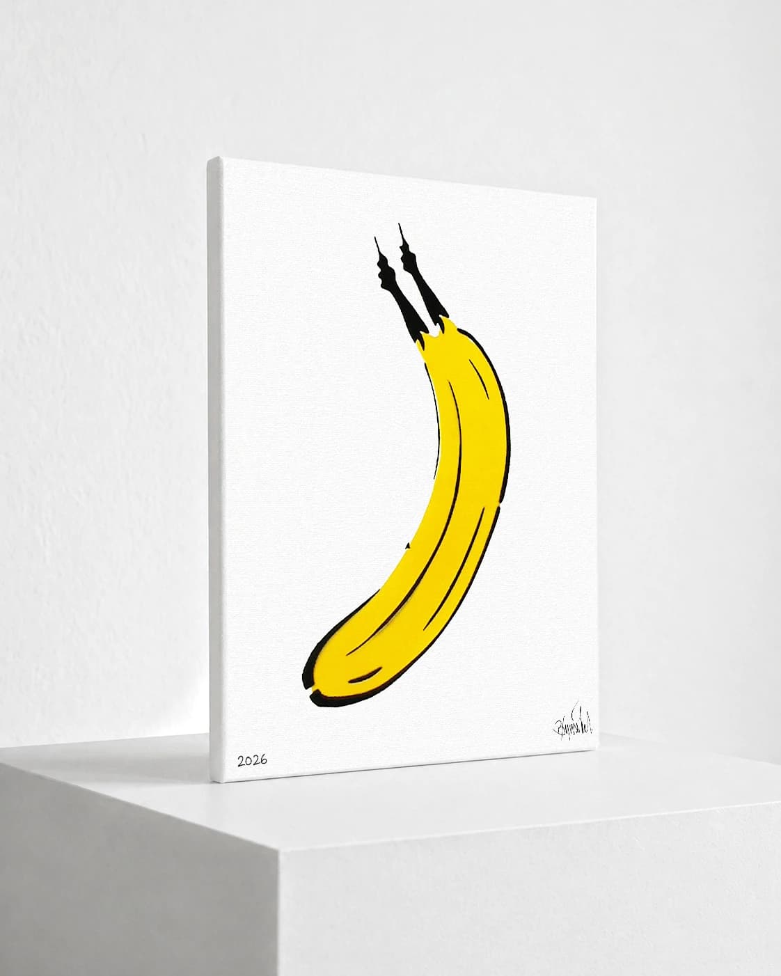 Gelbe Banane mit schwarzer Kontur auf weißem Hintergrund, unten links steht 2026.